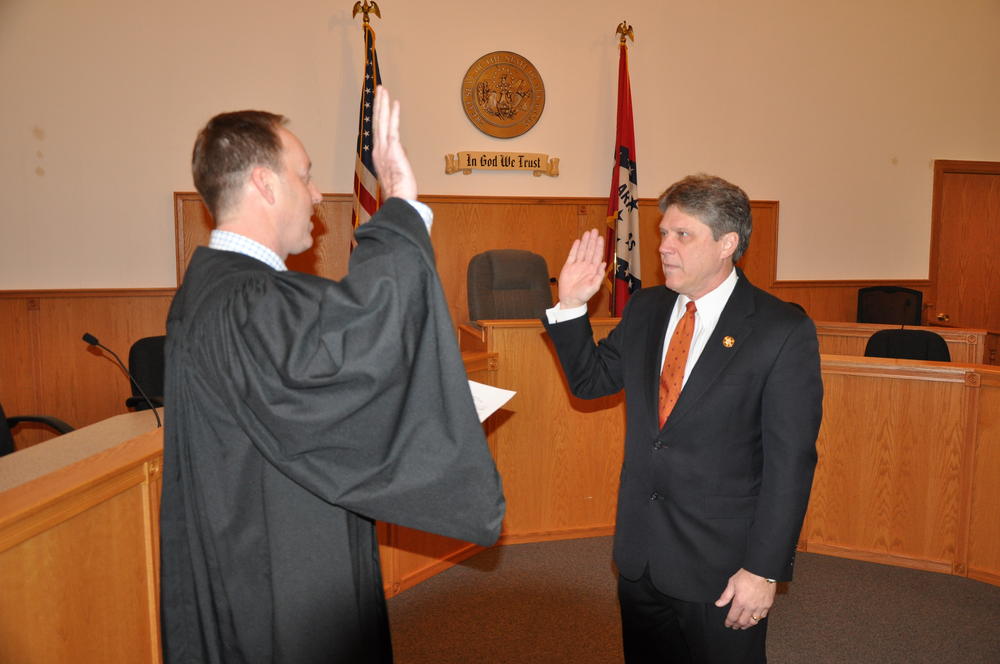 Sheriff John Montgomery is sworn in as the Sheriff for Baxter County by District Court Judge Jason Duffy.