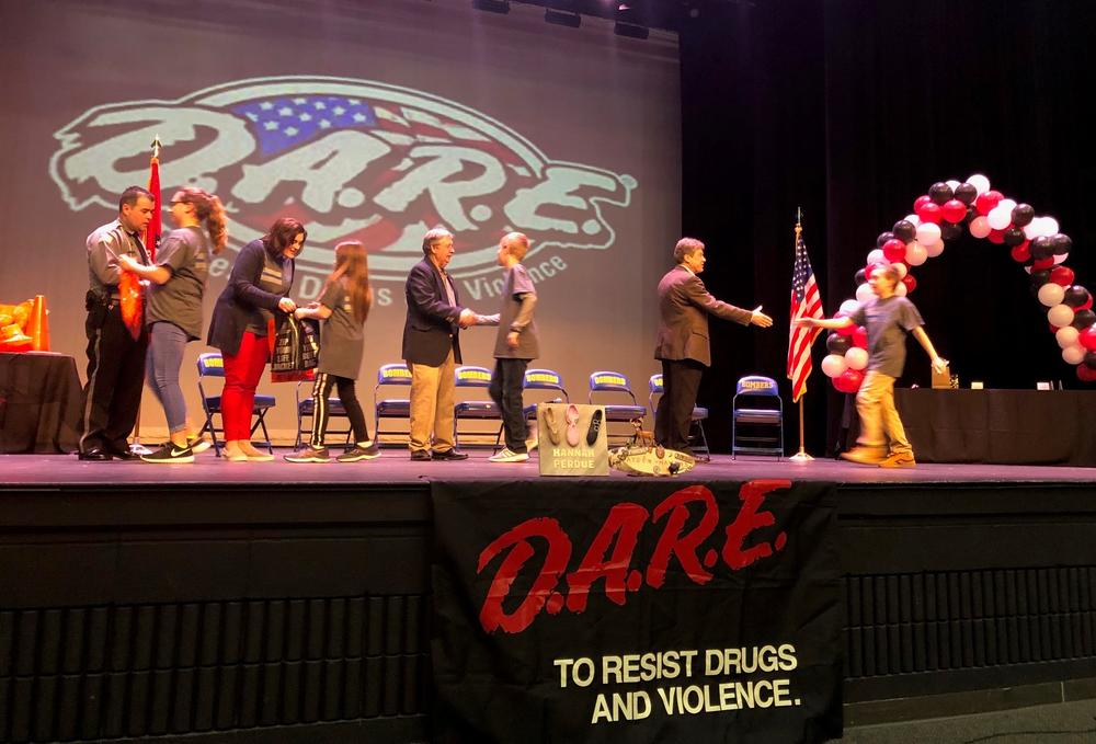 Over 300 Mountain Home 5th Grade students crossed the stage last night at Dunbar Auditorium to celebrate their graduating the Drug Abuse Resistance Education (D.A.R.E.) program