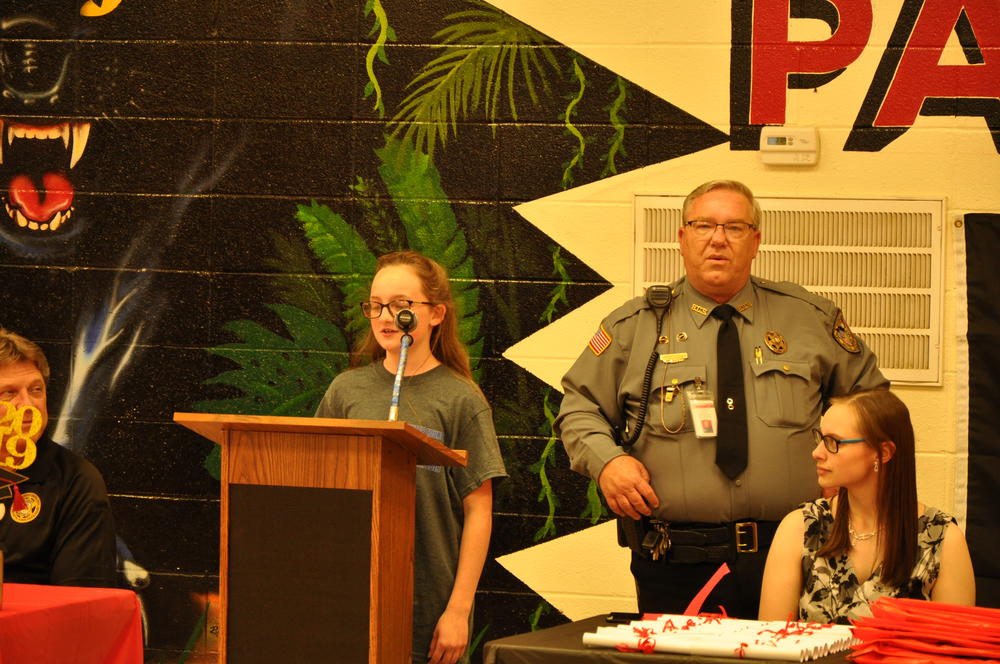 School Resource officer Deputy Billy Cox lead commencement and introduced Essay winners; Emma Richard and Arrine Woody.  One very special young lady Harmony Buck was recognized as the best student of the year.